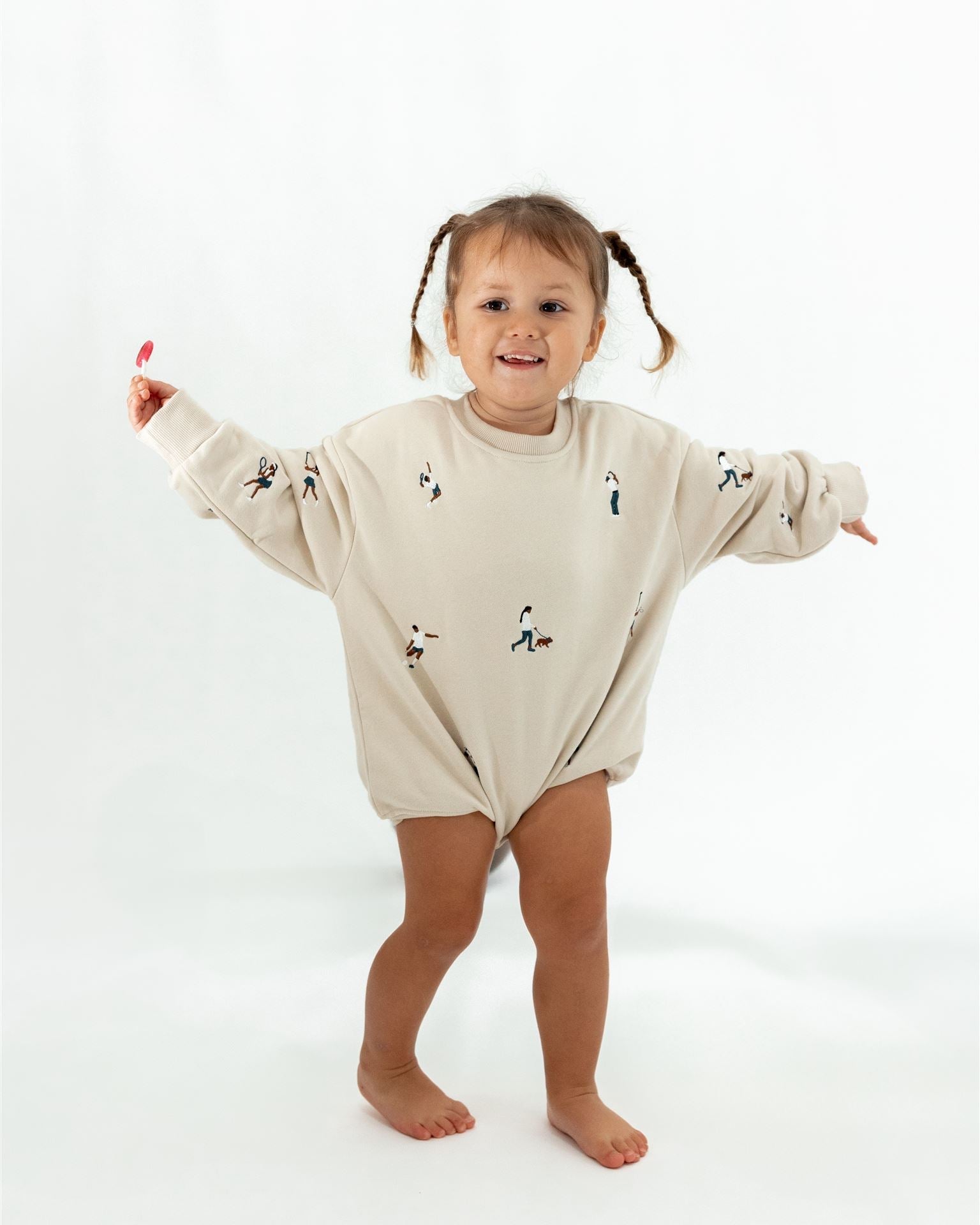 BEIGE SPORTS SWEATER ROMPER